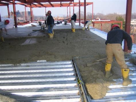 concrete slab on metal deck against house|residential steel deck slab.